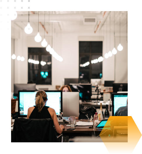 women working at office tables